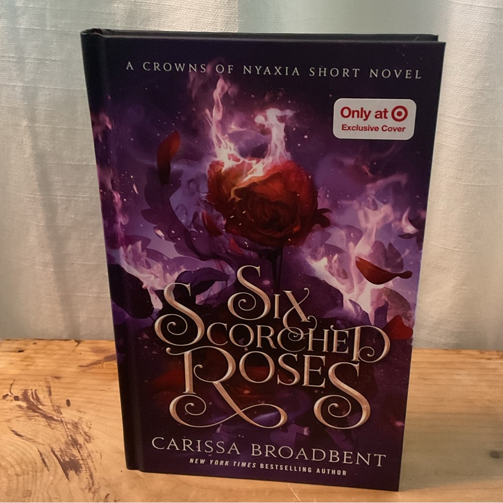 Six Scorched Roses Hardcover Book